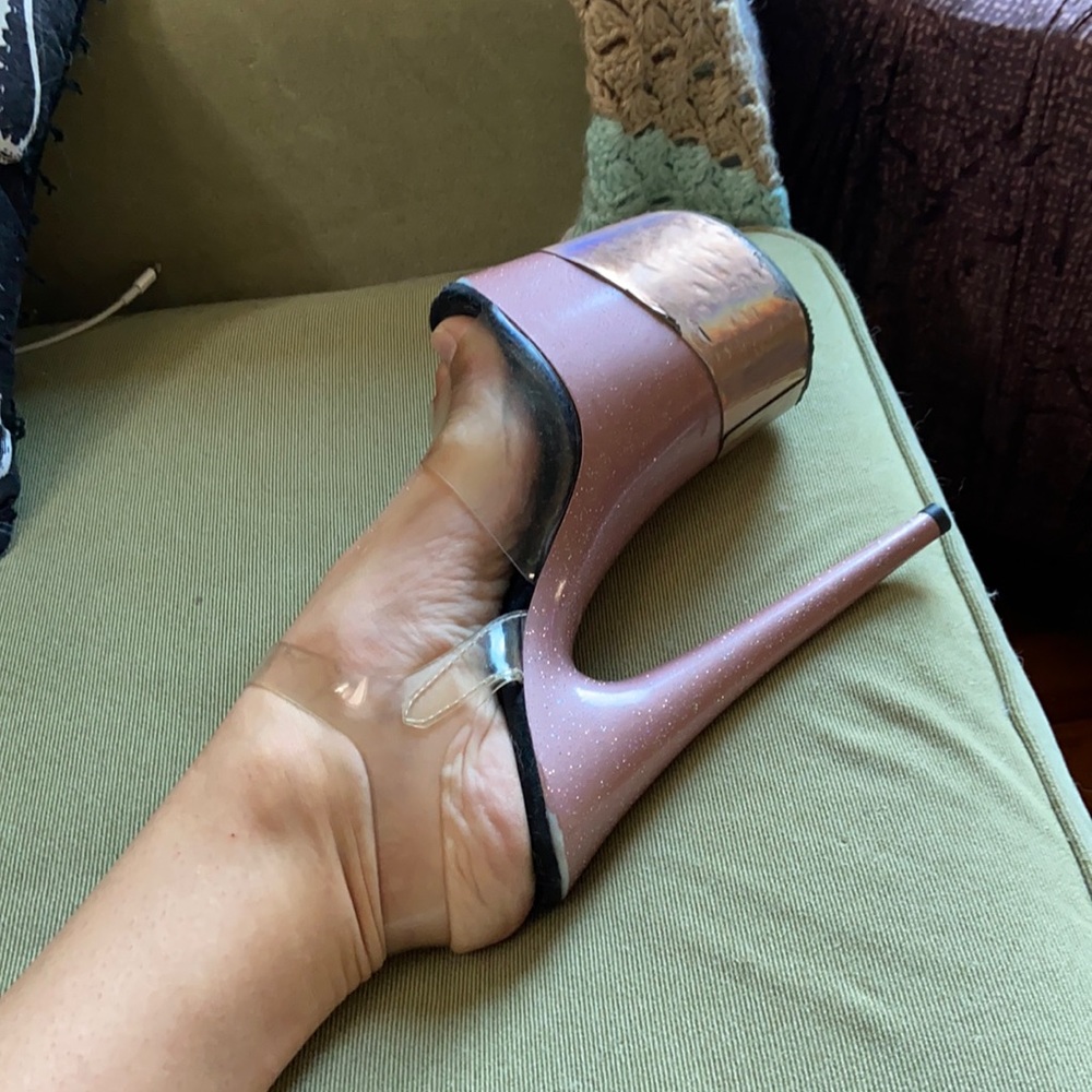 Pair of well-loved pleaser heels
